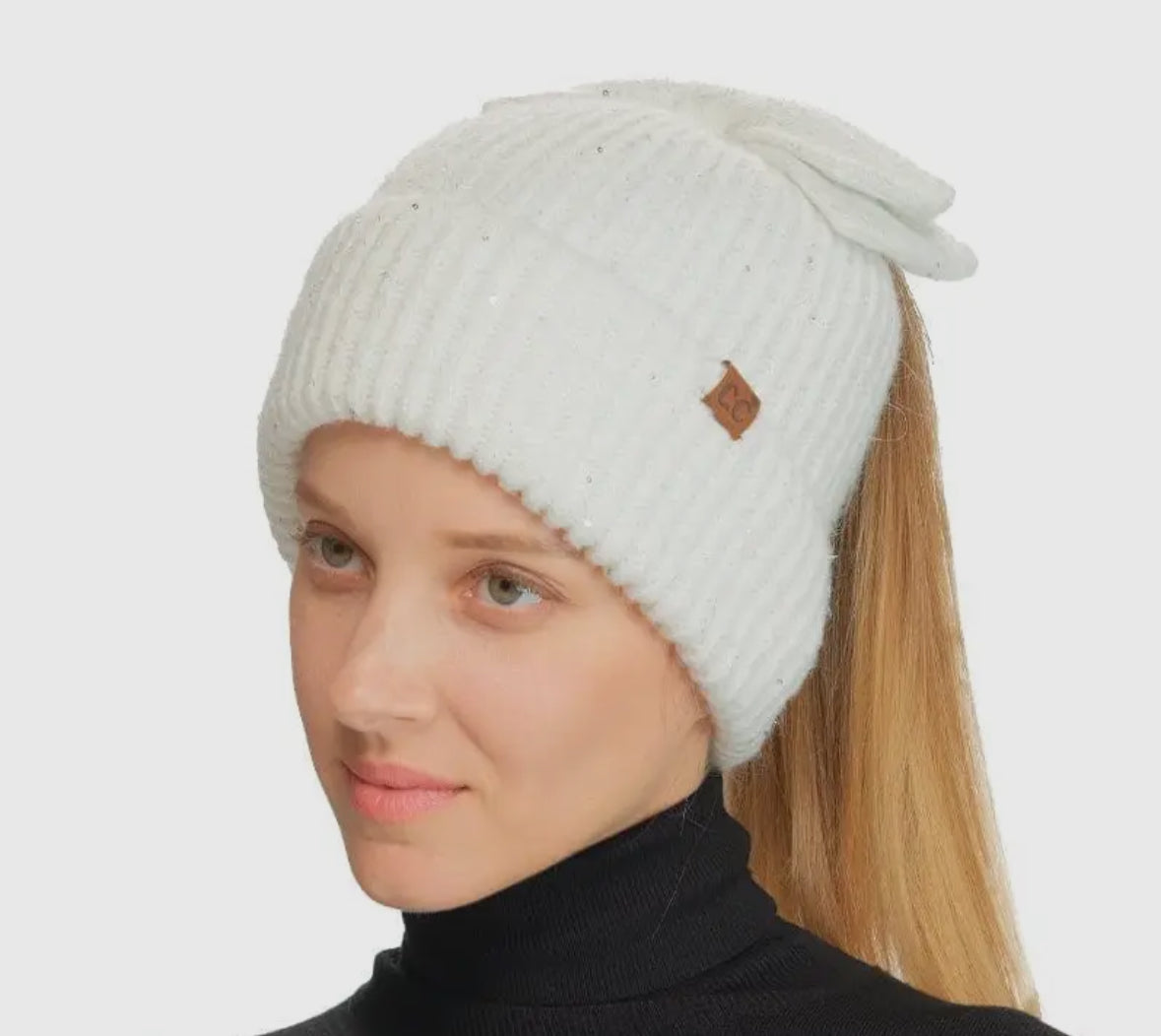2 way options: Pony tail style and Regular style Beanie