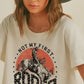 Not My First Rodeo Cowboy
Graphic Tee