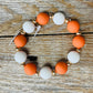 Orange & White Beaded Bracelet