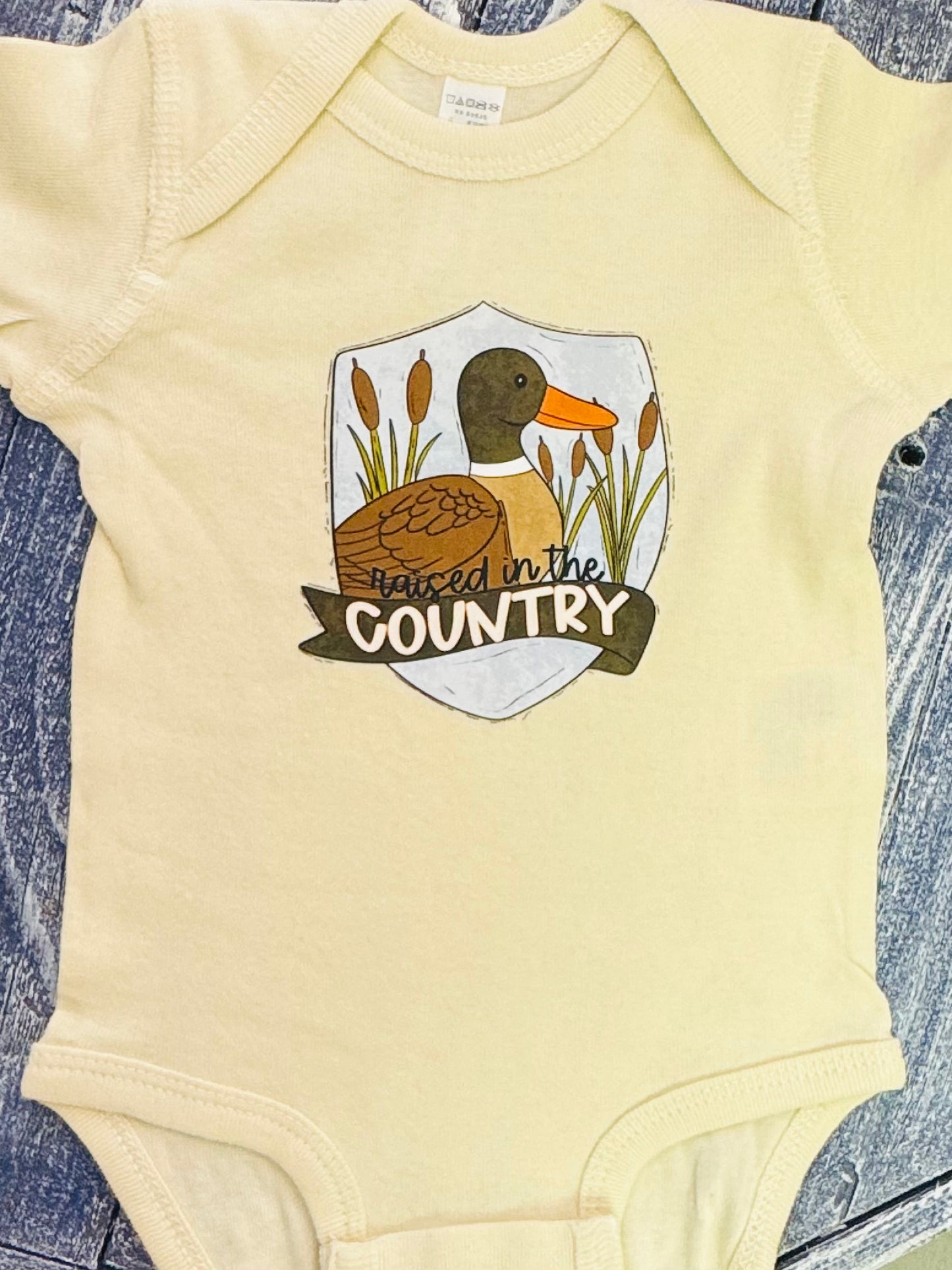 Raised in the Country Onesie
